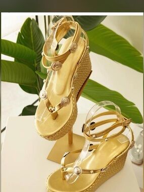 Gold Wedge Sandals with Decorative Medallions